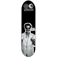 Foundation Nice skateboard deck: Black deck with Foundation logos and wordmark at the top and a black and white photo cut-out of a smiling man in a light suit and sunglasses giving two thumbs up, with a small speech bubble beside him.
