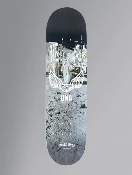Unabomber No Apollo Series - Walk skateboard deck: Photograph of the moon's surface with a lunar vehicle and tyre tracks under a black sky, overlaid with a white winged clasped-hands emblem above the letters UNA.