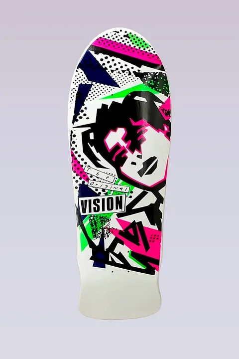 Vision Street Wear MG - Modern Concave - White skateboard deck: A white old-school shaped deck with an angular, pixelated black face with pink details, surrounded by neon pink and green shards, halftone dots and a Vision label with scribbled handwriting.