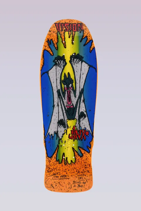 Vision Street Wear Original Jinx Modern Concave - Orange Stain skateboard deck: A screaming bat with spread grey wings hangs over a blue and yellow-green beam, with torn orange edges and Vision at the top. Jinx is in red, with handwritten notes including Skate Outta Hell and Blind as a Bat.