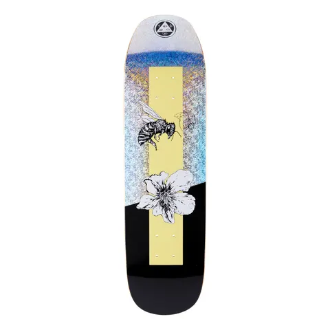 Welcome Adaptation on Son of Moontrimmer - Glitter Foil - 8.25 skateboard deck: A black and white ink illustration of a bee above a hibiscus-type flower on a pale yellow vertical stripe, over a holographic glitter-foil top half and a solid black lower half split on a diagonal. Welcome's circular emblem sits at the nose.