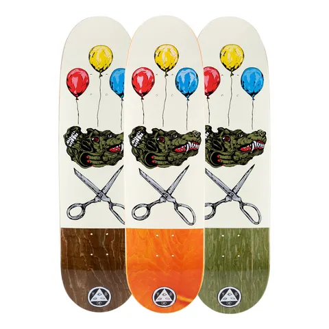 Welcome Bark on Pysanka 2.0 - Bone/Various Stains skateboard deck: Three versions of one deck with a bone-white top: three red, yellow and blue balloons float above a snarling green wolf-like head with a fleshy hand, over crossed scissors. Tails are stained brown, orange or green.