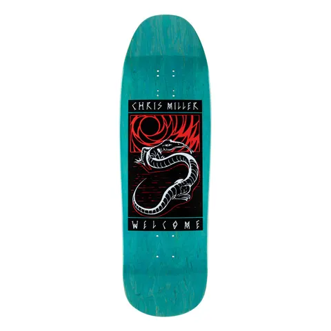 Welcome Chris Miller Lizard on Gaia - Teal Stain - 9.6 skateboard deck: Teal-stained old-school shape deck with a black panel showing a white lizard coiled in front of a red spiral sun, with the rider name above and WELCOME below in runic-style capitals.
