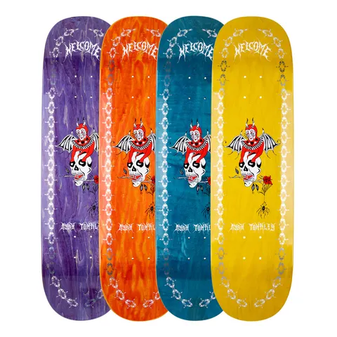 Welcome Ryan Townley Angel on Enenra - Various Stains - 8.5 skateboard deck: Four decks in purple, orange, teal and yellow stain show the same design: a red devil with bat wings coiled round a skull that bites a rose, with a spider below. A silver chain runs down each edge under blackletter text.