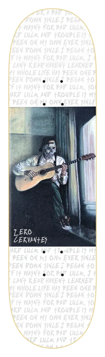 Zero Cervantes - Blues 8.5 skateboard deck: Painted scene of a skeleton-faced man in a cap playing an acoustic guitar beside a window, set in a rectangle on a white deck covered in faint repeated lyric text about bad luck and trouble.