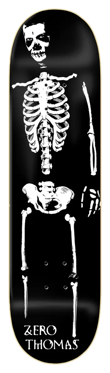 Zero Dying To Live Skeleton skateboard deck: A full white skeleton laid out down the length of a black deck, with a skull face, ribcage, pelvis and leg bones, as in an X-ray style print. Zero and rider name in white serif capitals at the tail.