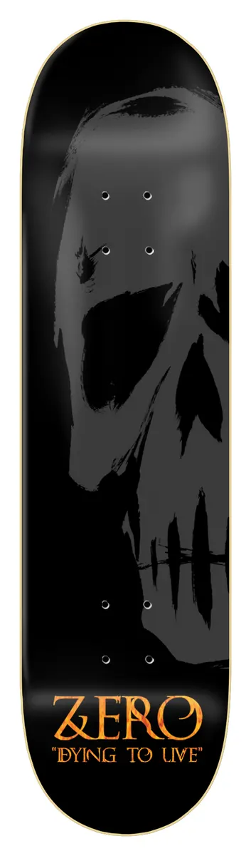 Zero Dying To Live Skull 8.5 skateboard deck: Large grey brushed skull, cropped at the edge, on a black deck, with the Zero name and a Dying to Live slogan in orange gothic lettering at the bottom.
