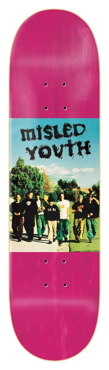 Zero Misled Youth 8.25 - Pink skateboard deck: Colour photo panel across the middle of a pink-stained deck showing a group of young men in dark clothes walking along a path past trees under a blue sky, with Misled Youth in a scratchy black hand-drawn font above them.