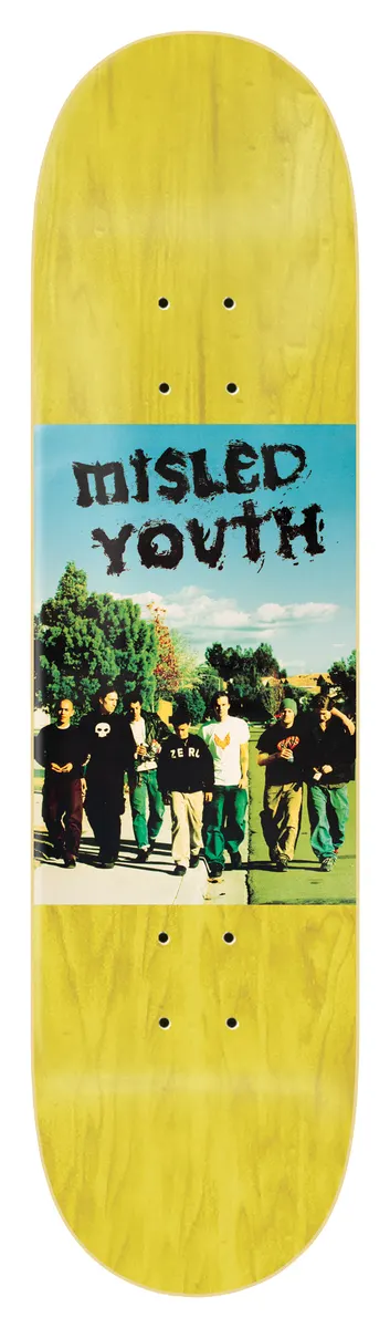 Zero Misled Youth 8.25 - Yellow skateboard deck: Colour photo panel across the middle of a yellow-stained deck showing a group of young men in dark clothes walking along a path past trees under a blue sky, with Misled Youth in a scratchy black hand-drawn font above them.