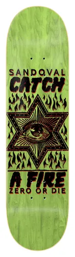 Zero Sandoval - Catch A Fire skateboard deck: A six-pointed star containing a staring engraved eye, surrounded by black flames, with Sandoval Catch A Fire and Zero or Die lettering above and below on a green stained deck.