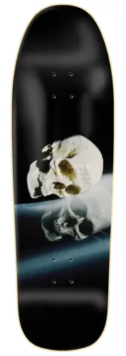 Zero Thomas - Death Awaits Cruiser skateboard deck: A photographic pale human skull rests on a reflective surface with its reflection beneath, on a black cruiser-shaped deck with a cream edge. Small Zero lettering is faintly printed on the skull.