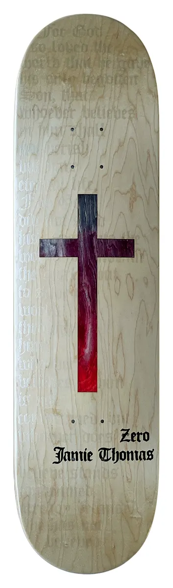 Zero Thomas Die - Cut Cross Natural skateboard deck: Cross fading from purple to red set on bare natural maple, with faint blackletter text running behind it and 'Zero Jamie Thomas' in blackletter at the tail.