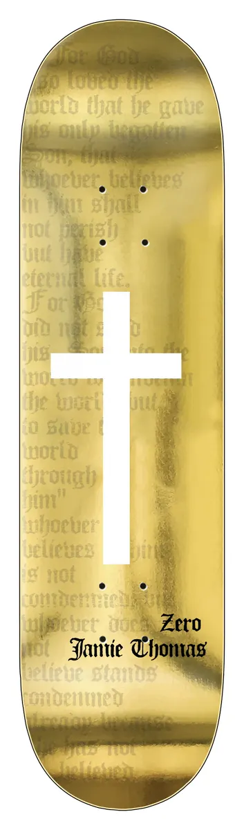 Zero Thomas - Foil Cross 8.25 skateboard deck: A white cross over faint blackletter Bible text (John 3:16) on a gold foil deck, with gothic name text near the tail.