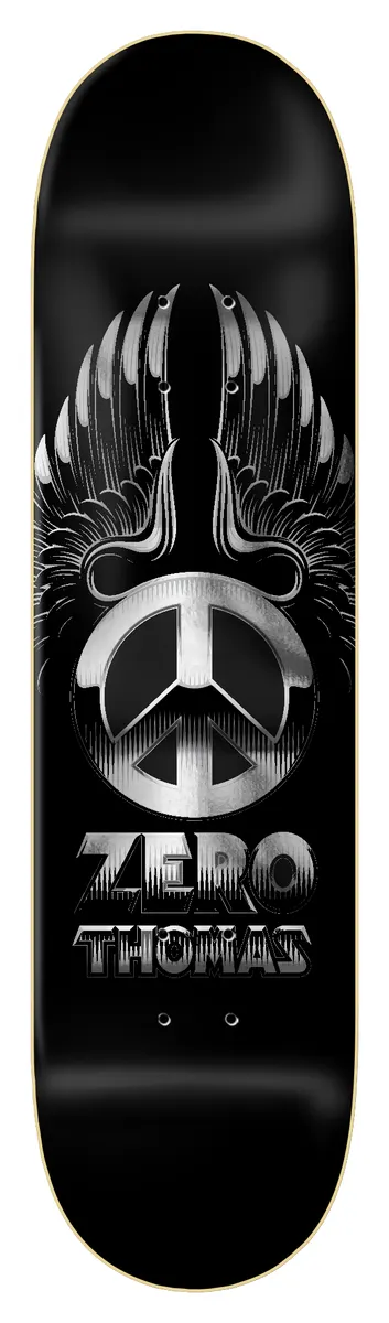 Zero Thomas - Metal Peace - Silver Foil 8.25 skateboard deck: A chrome-effect peace symbol with spread metallic wings above the words Zero Thomas in metallic lettering, on a glossy black deck.