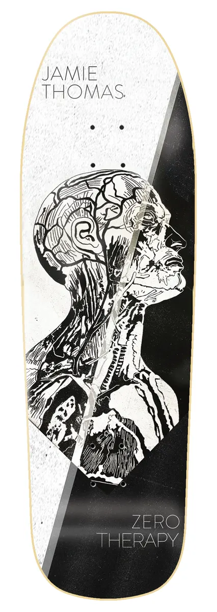 Zero Thomas - Therapy 9.5 Cruiser skateboard deck: An anatomical engraving of a human head and neck in profile showing muscles and veins, on a wide shaped deck split diagonally between white and black, with the rider name at the top and Zero Therapy at the bottom.