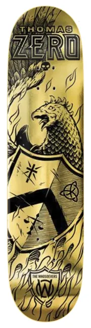 Zero Whosoevers - Thomas - Gold 8.0 skateboard deck: A black engraving-style coat of arms on a gold foil deck, showing a rooster perched on a shield with a Celtic knot, surrounded by flames, with THOMAS ZERO lettered at the nose and The Whosoevers badge at the tail.