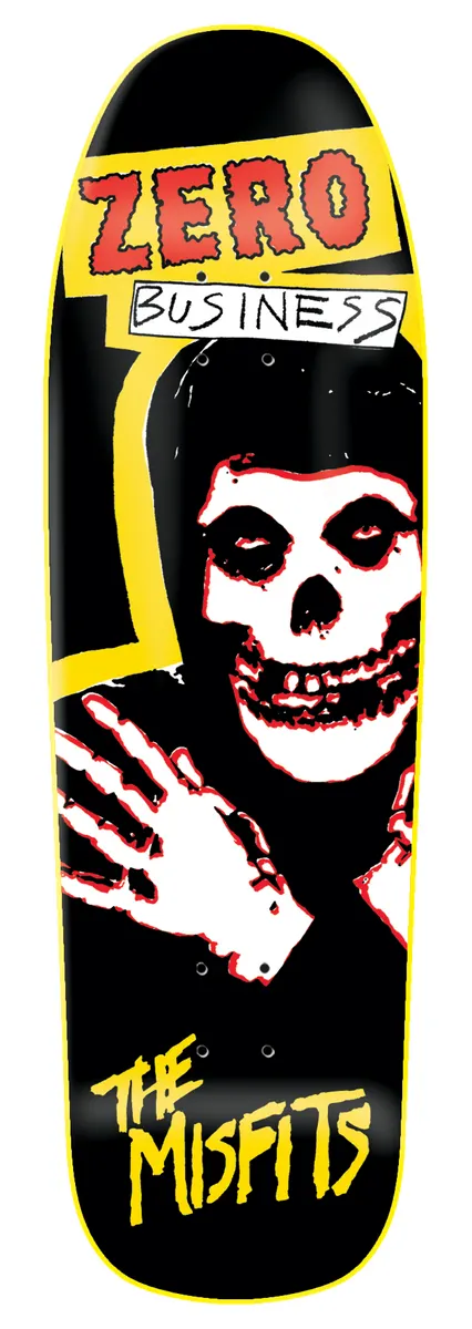 Zero Business - 9.5 skateboard deck: Old-school shaped black deck with a yellow outline and speech-bubble style header reading ZERO BUSINESS, above a white and red Misfits-style skull and hand. THE MISFITS is in yellow at the bottom.